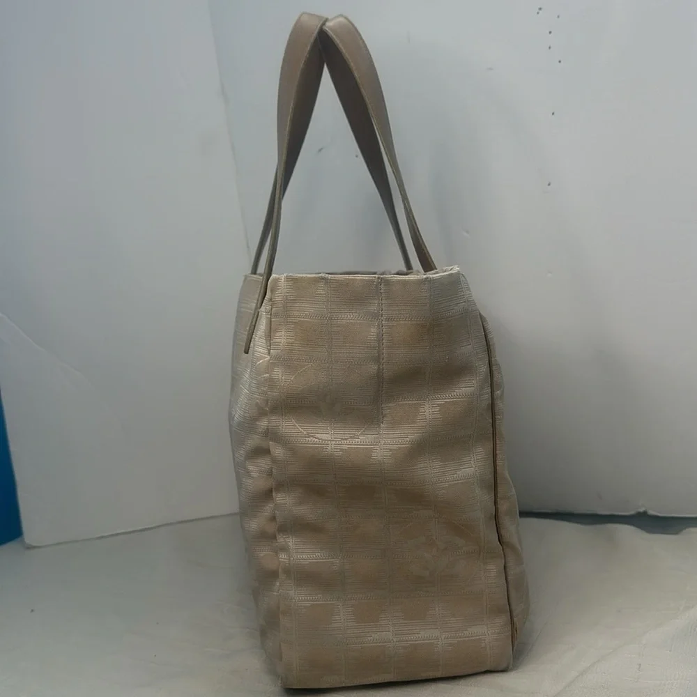 Chanel Travel Line tote in light beige / pale pinkish canvas